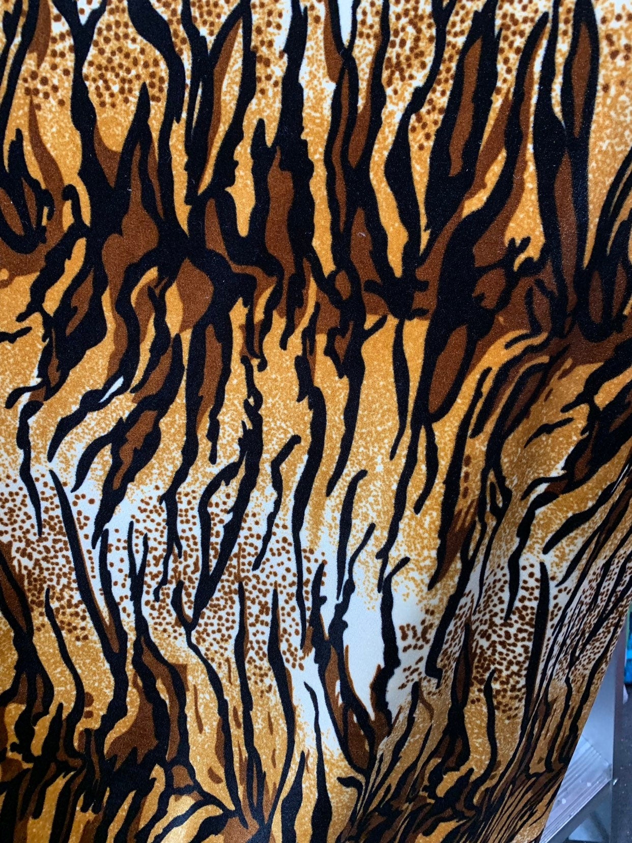 New tiger design  brown/gold heavy stretch velvet 4way 420 gsm 58/60" Sold by the YD. Ships worldwide from Los Angeles California USA.