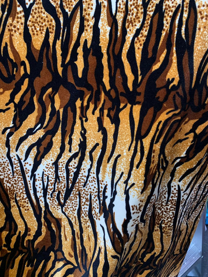 New tiger design  brown/gold heavy stretch velvet 4way 420 gsm 58/60" Sold by the YD. Ships worldwide from Los Angeles California USA.