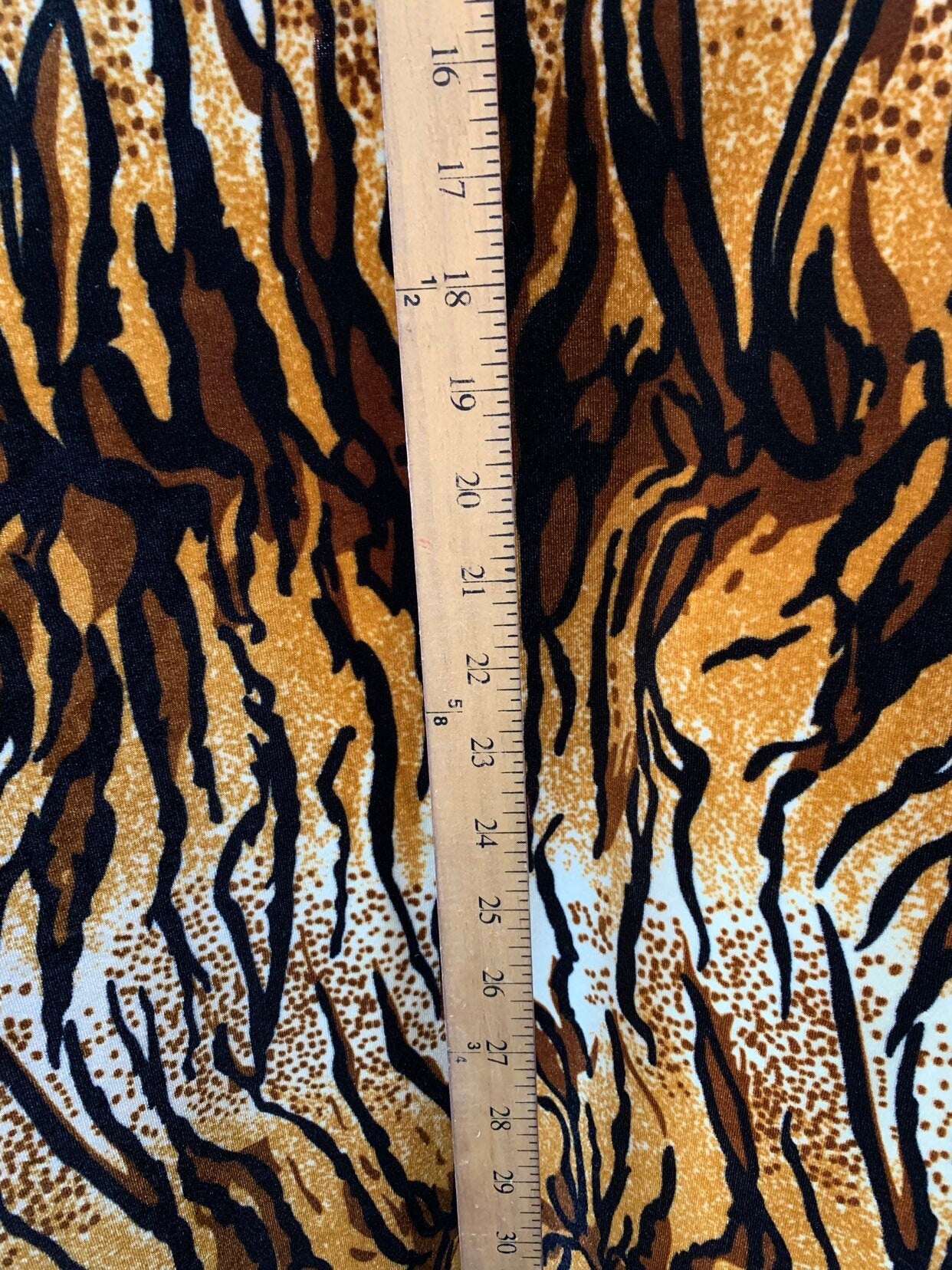 New tiger design  brown/gold heavy stretch velvet 4way 420 gsm 58/60" Sold by the YD. Ships worldwide from Los Angeles California USA.