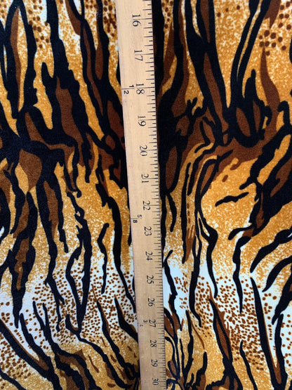 New tiger design  brown/gold heavy stretch velvet 4way 420 gsm 58/60" Sold by the YD. Ships worldwide from Los Angeles California USA.