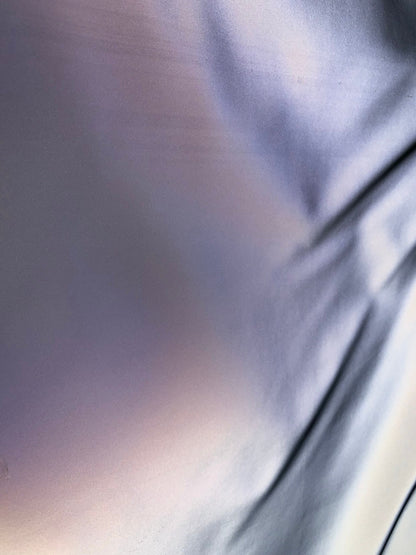 Reflective vinyl iridescent silver non stretch vinyl 58/60" Sold by the YD. Ships worldwide from Los Angeles California USA.