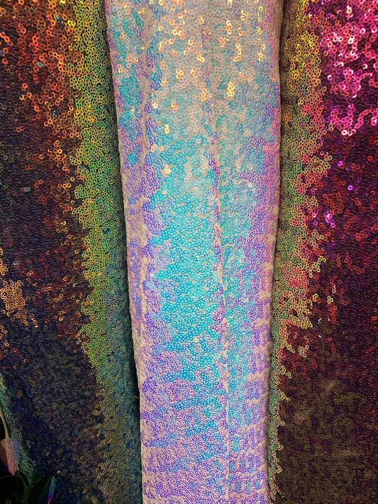 New iridescent sequins cosmic design 2tone glitz sequins on stretch power mesh 4way 58/60" Sold by the YD. Ships worldwide from Los Angeles