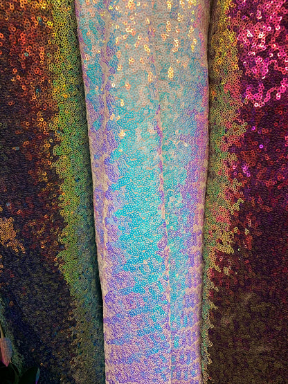 New iridescent sequins cosmic design 2tone glitz sequins on stretch power mesh 4way 58/60" Sold by the YD. Ships worldwide from Los Angeles