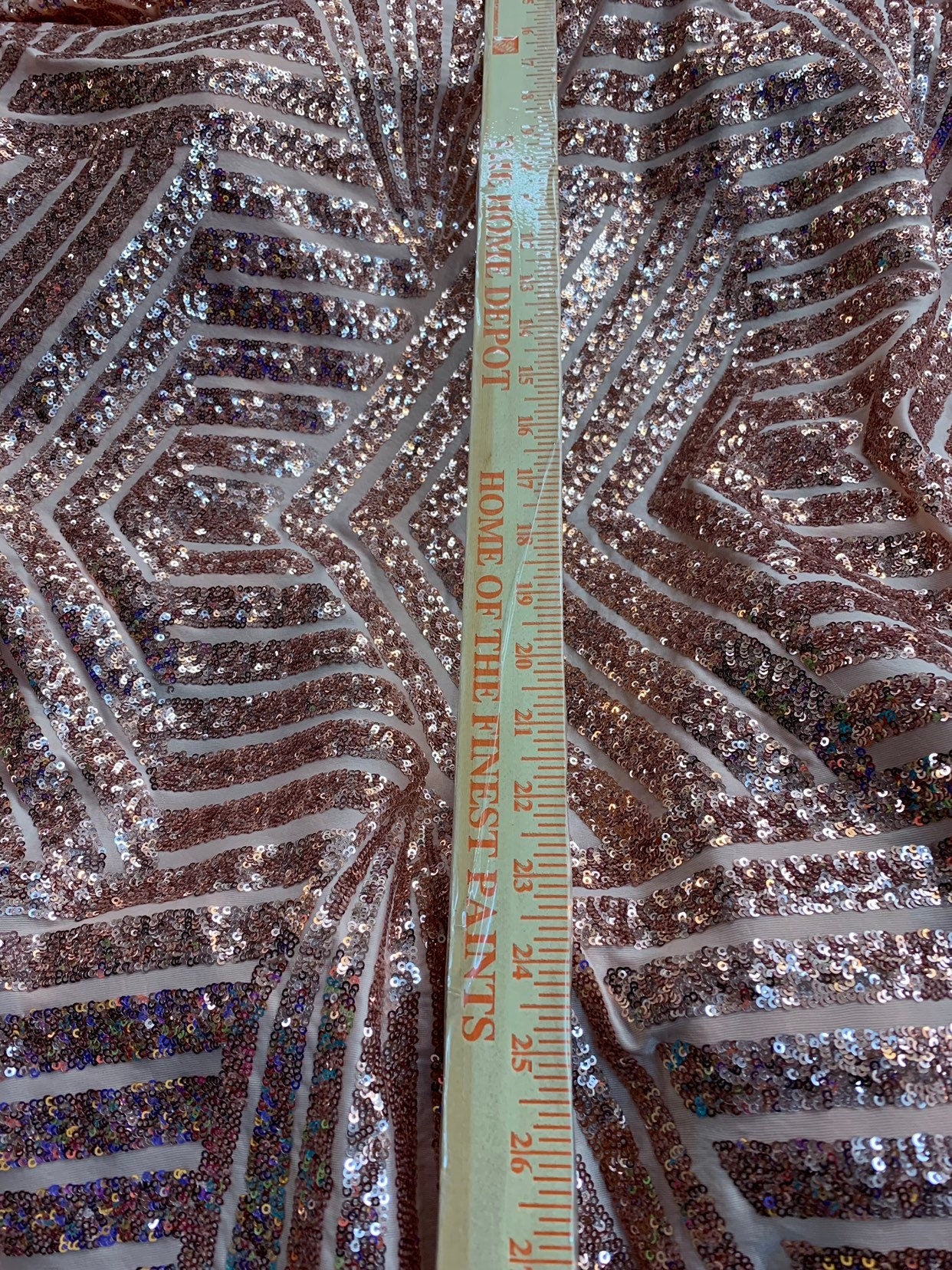 Jennifer design mini glitz sequins rose gold on spandex base 2way stretch 55/57" Sold by the YD. Ships worldwide from Los Angeles California