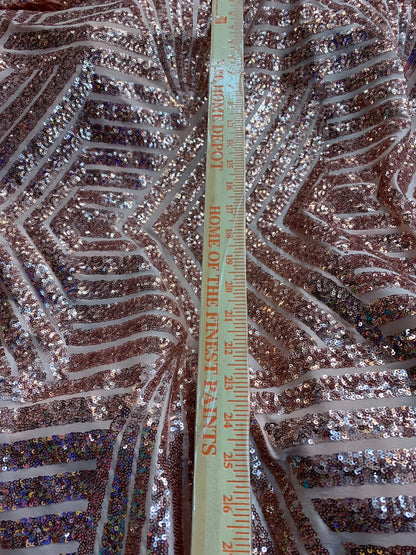 Jennifer design mini glitz sequins rose gold on spandex base 2way stretch 55/57" Sold by the YD. Ships worldwide from Los Angeles California