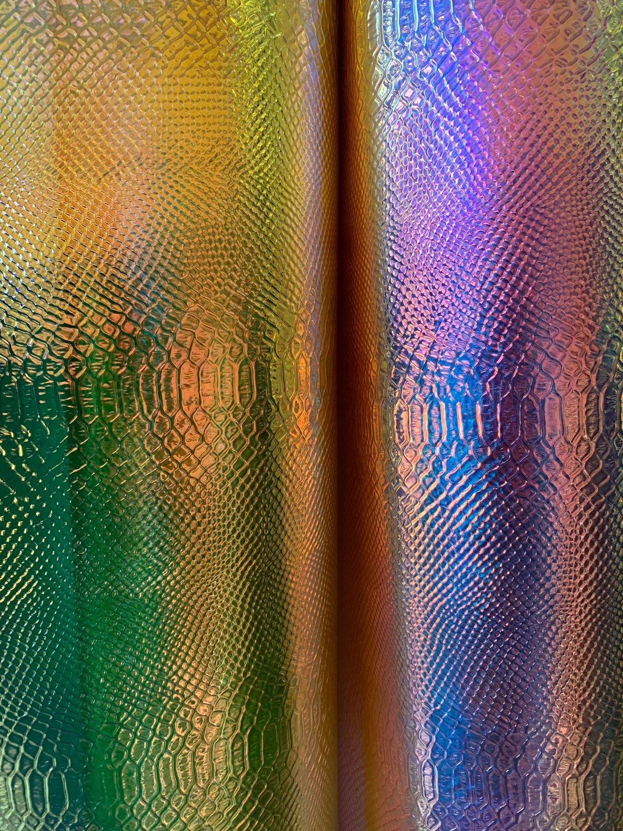 New iridescent white and yellow snake design clear vinyl non stretch 48/50" Sold by the YD. Ships worldwide from Los Angeles California USA