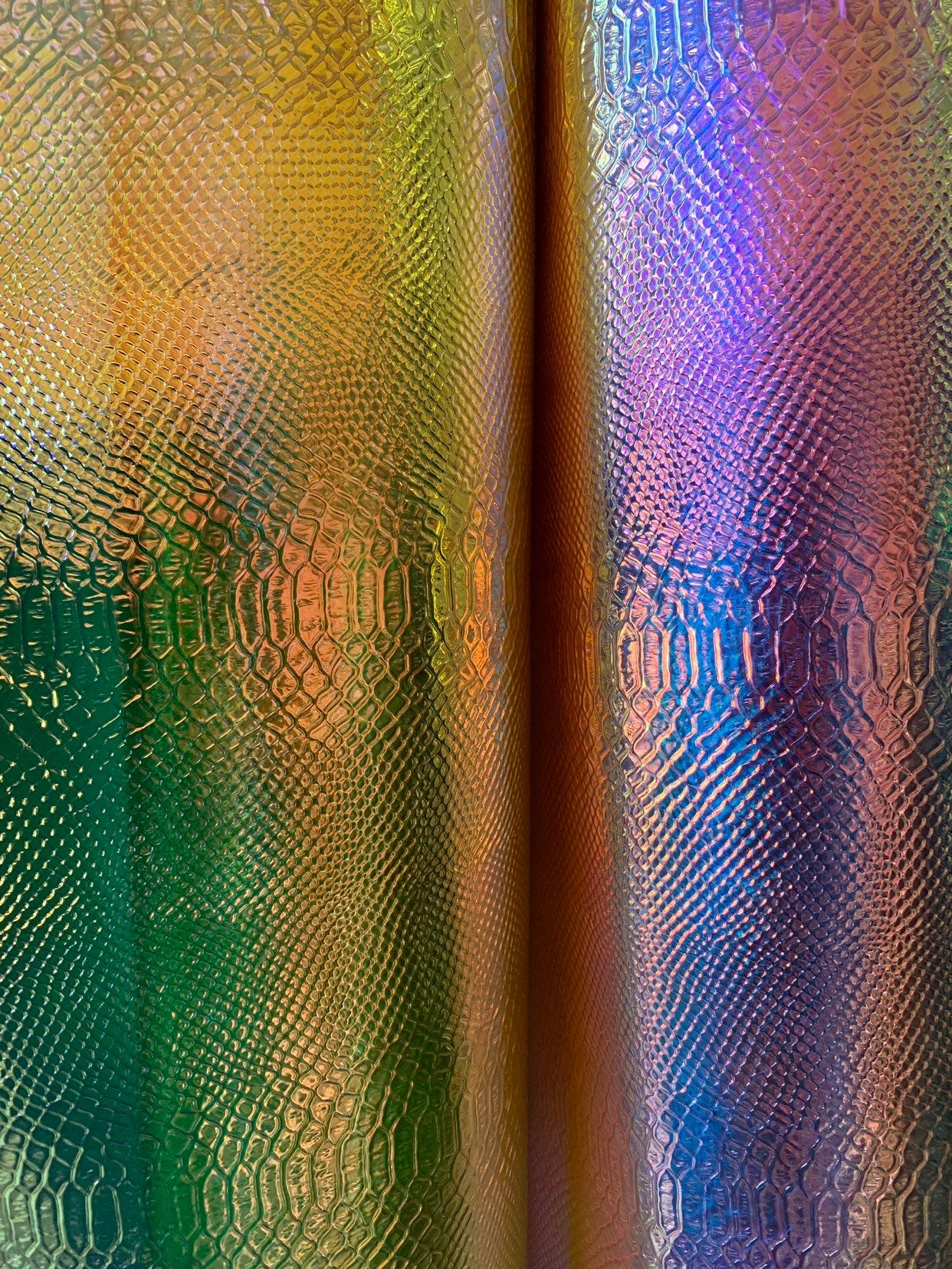 New iridescent white and yellow snake design clear vinyl non stretch 48/50" Sold by the YD. Ships worldwide from Los Angeles California USA