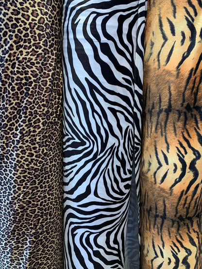 Heavy stretch velvet multi animal print 4way stretch 58/60" Sold by the YD. Ships worldwide from Los Angeles California USA.