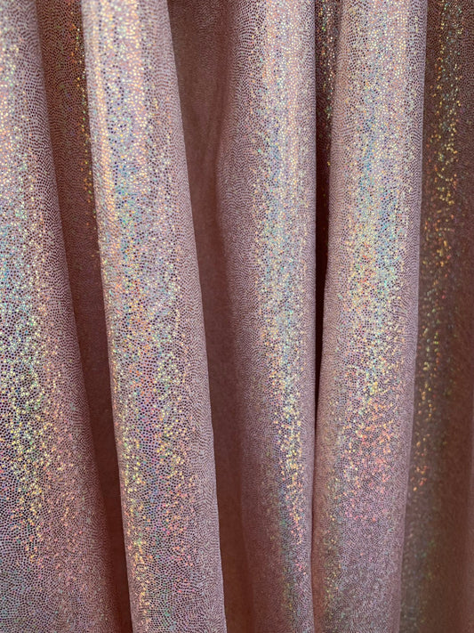 Rose gold hologram foggy foil metallic nylon spandex with foggy foil 4way stretch 58/60" Sold by the YD. Ships worldwide from Los Angeles CA