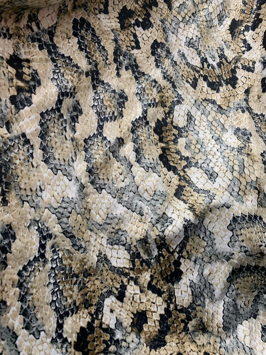 New Snake design print ok spandex fabric 2way stretch 58/60" Sold by the YD. Ships worldwide from Los Angeles California USA.