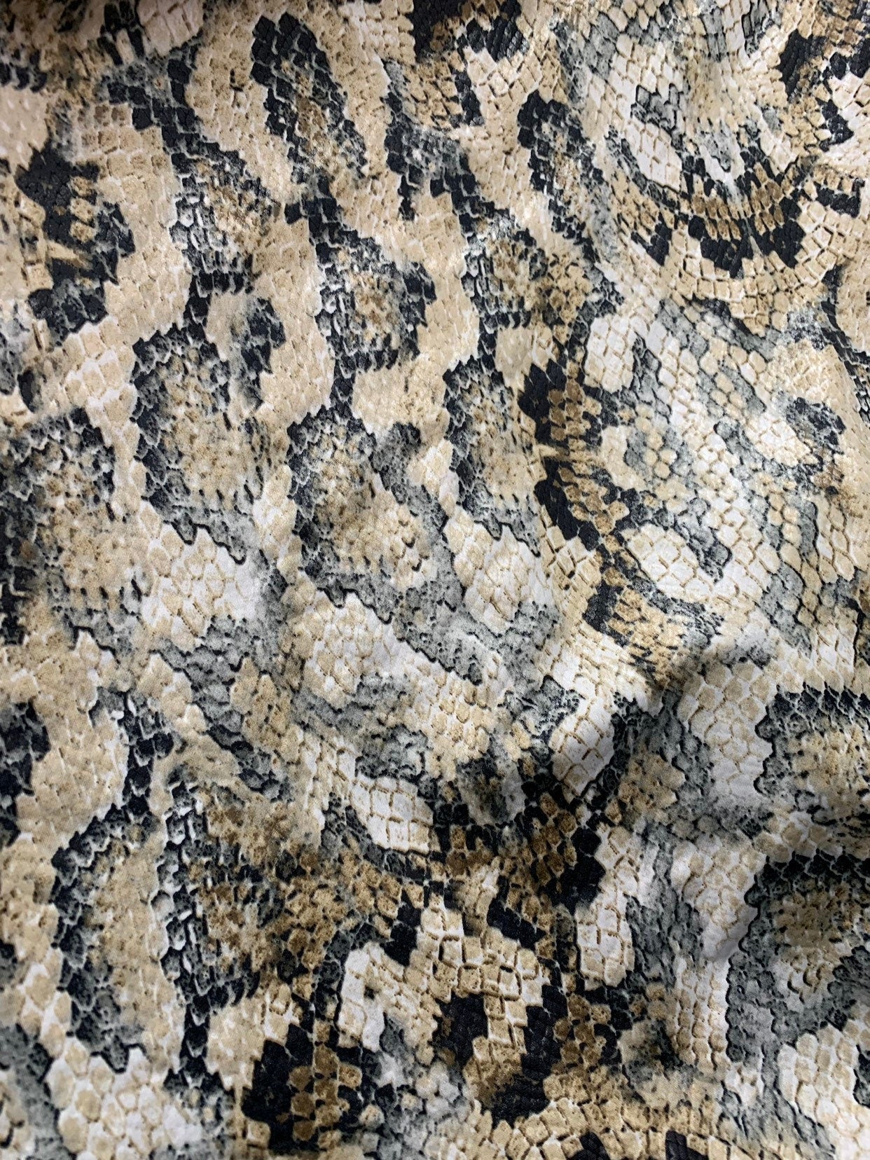 New Snake design print ok spandex fabric 2way stretch 58/60" Sold by the YD. Ships worldwide from Los Angeles California USA.