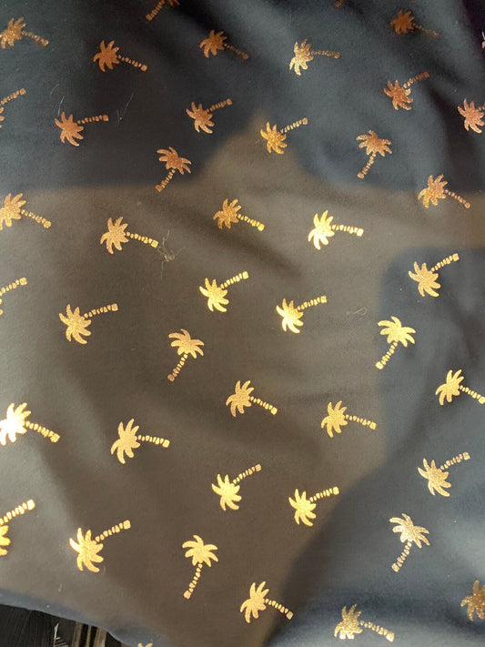 New metallic print nylon spandex palm tree design 4way stretch 58/60" Sold by the YD. Ships worldwide from Los Angeles California USA.