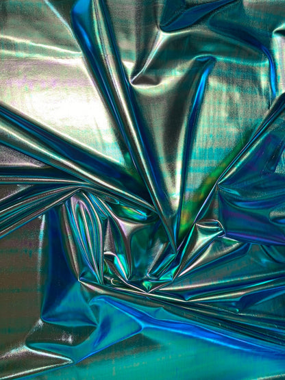 New blue green iridescent foil metallic spandex foil 4way stretch 58/60" Sold by the YD. Ships worldwide from Los Angeles California USA.