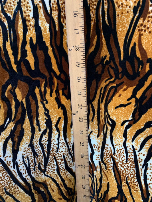 New tiger design  brown/gold heavy stretch velvet 4way 420 gsm 58/60" Sold by the YD. Ships worldwide from Los Angeles California USA.
