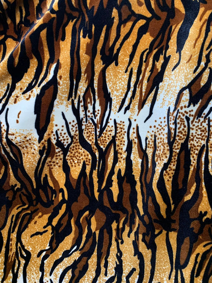New tiger design  brown/gold heavy stretch velvet 4way 420 gsm 58/60" Sold by the YD. Ships worldwide from Los Angeles California USA.