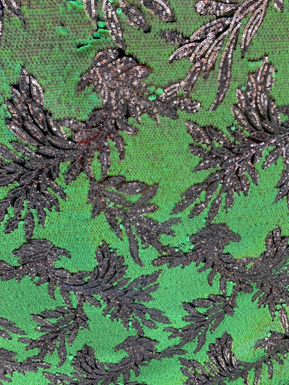 Iridescent Hawaii design 2 tone sequins on mesh base 58/60" sold by the yd. Ships worldwide from Los Angeles California USA