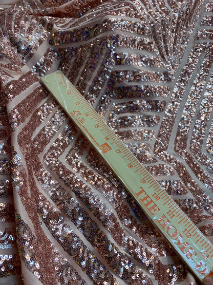 Jennifer design mini glitz sequins rose gold on spandex base 2way stretch 55/57" Sold by the YD. Ships worldwide from Los Angeles California
