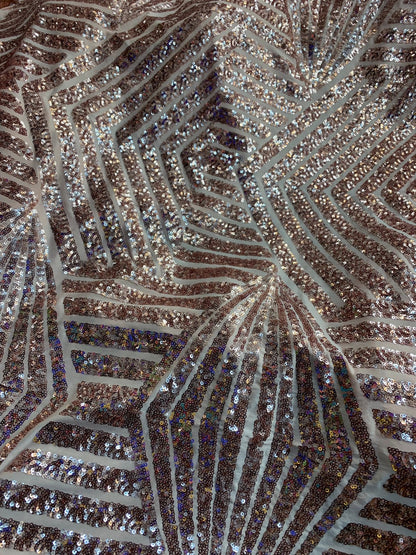 Jennifer design mini glitz sequins rose gold on spandex base 2way stretch 55/57" Sold by the YD. Ships worldwide from Los Angeles California