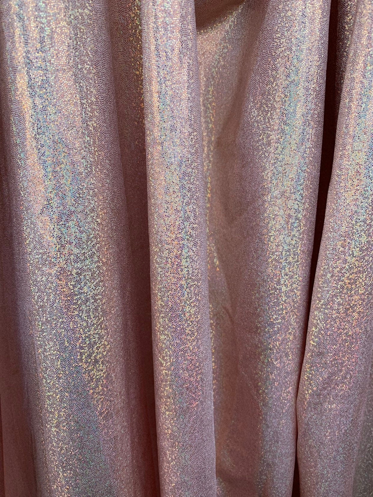 Rose gold hologram foggy foil metallic nylon spandex with foggy foil 4way stretch 58/60" Sold by the YD. Ships worldwide from Los Angeles CA