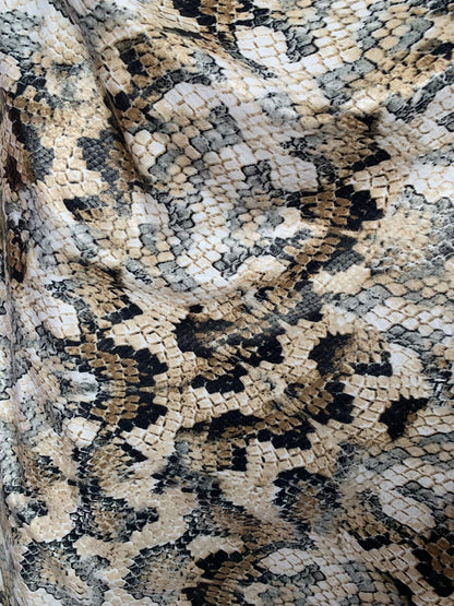 New Snake design print ok spandex fabric 2way stretch 58/60" Sold by the YD. Ships worldwide from Los Angeles California USA.