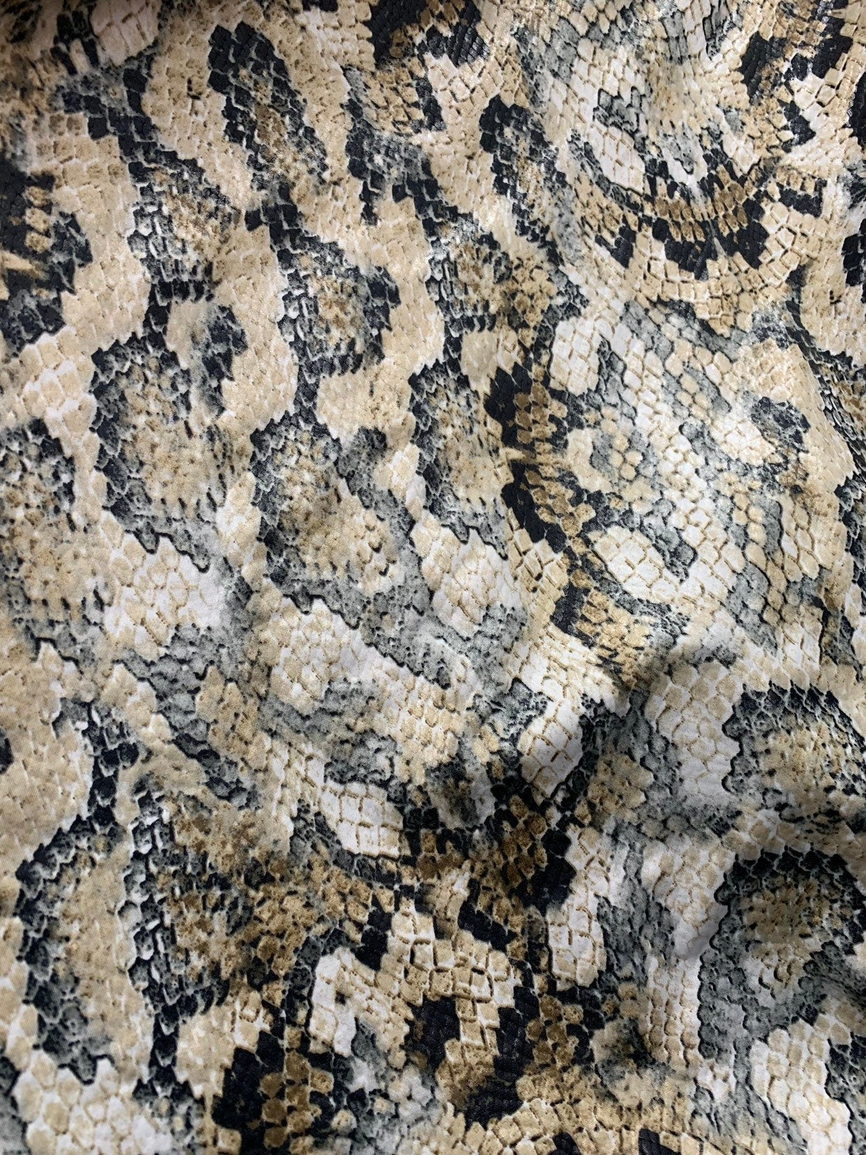 New Snake design print ok spandex fabric 2way stretch 58/60" Sold by the YD. Ships worldwide from Los Angeles California USA.