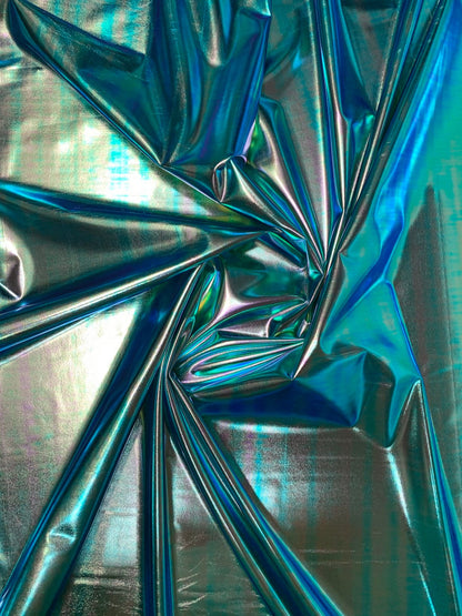 New blue green iridescent foil metallic spandex foil 4way stretch 58/60" Sold by the YD. Ships worldwide from Los Angeles California USA.