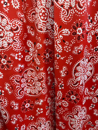 Bandana paisley design on nylon spandex 4way Stretch 58/60" Sold by the YD. Ships worldwide from Los Angeles California USA