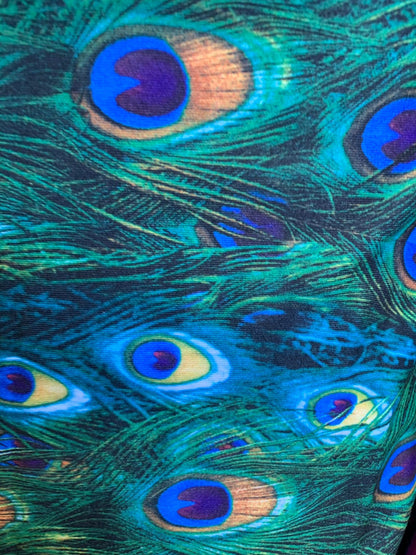 New peacock design print on nylon spandex 4way stretch 58/60" Sold by the YD. Ships worldwide from Los Angeles California USA.