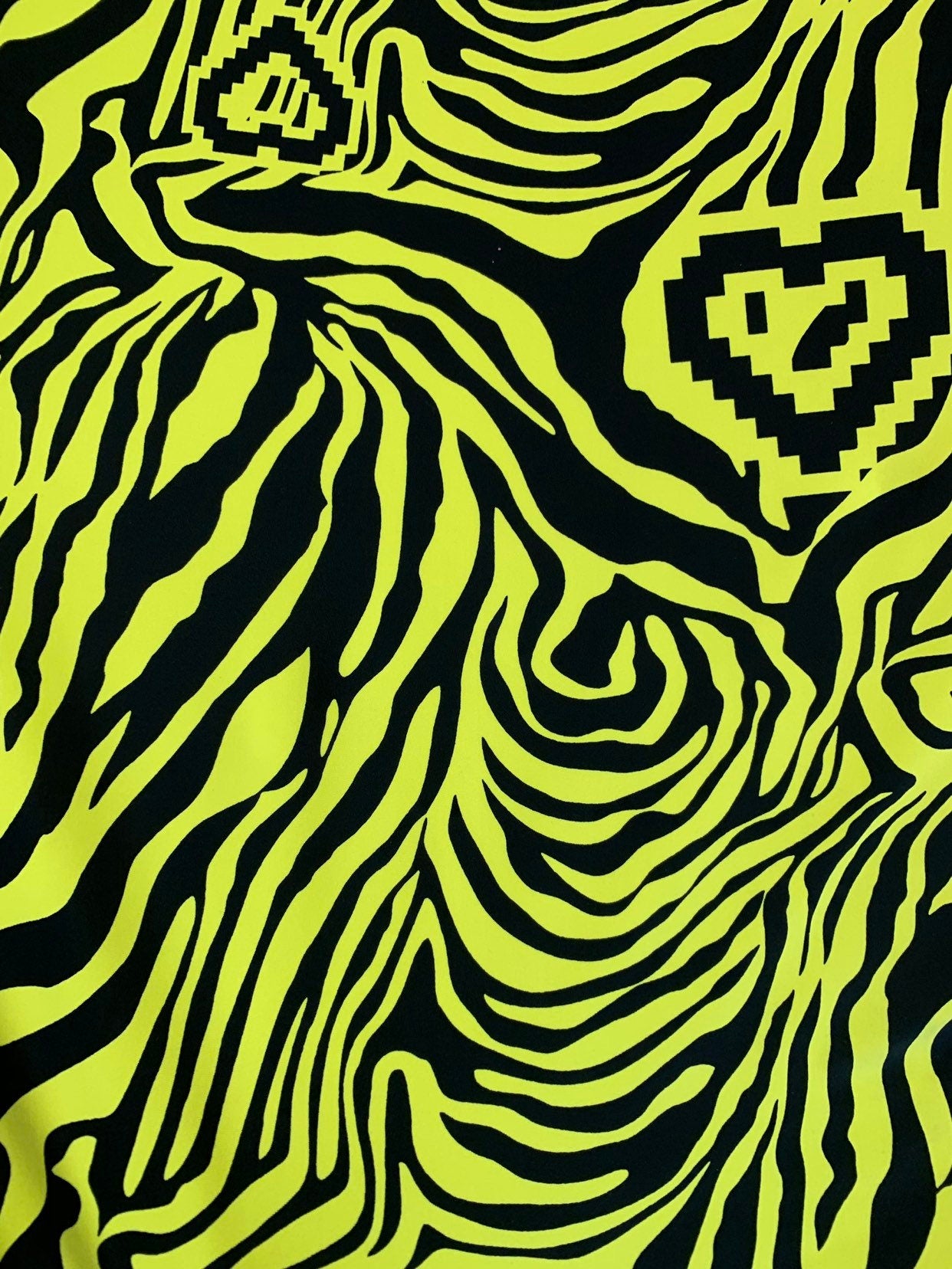 New zebra design black/yellow print on nylon spandex 4way stretch 58/60" Sold by the YD. Ships worldwide from Los Angeles California USA.