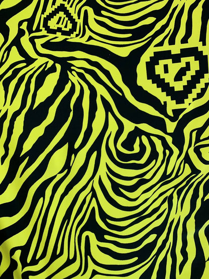 New zebra design black/yellow print on nylon spandex 4way stretch 58/60" Sold by the YD. Ships worldwide from Los Angeles California USA.