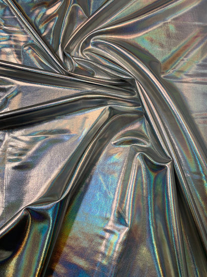Iridescent silver all over foil metallic nylon Spandex 4way stretch 58/60" Sold by the YD. Ships worldwide from Los Angeles California USA