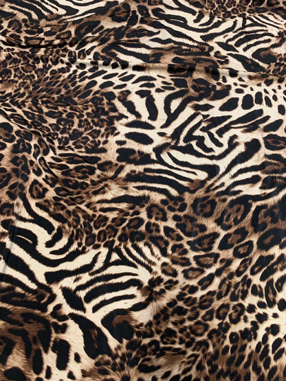 New exotic leopard animal print brown/taupe 4way stretch Nylon spandex 58/60" Sold by the YD. Ships worldwide from Los Angeles California.