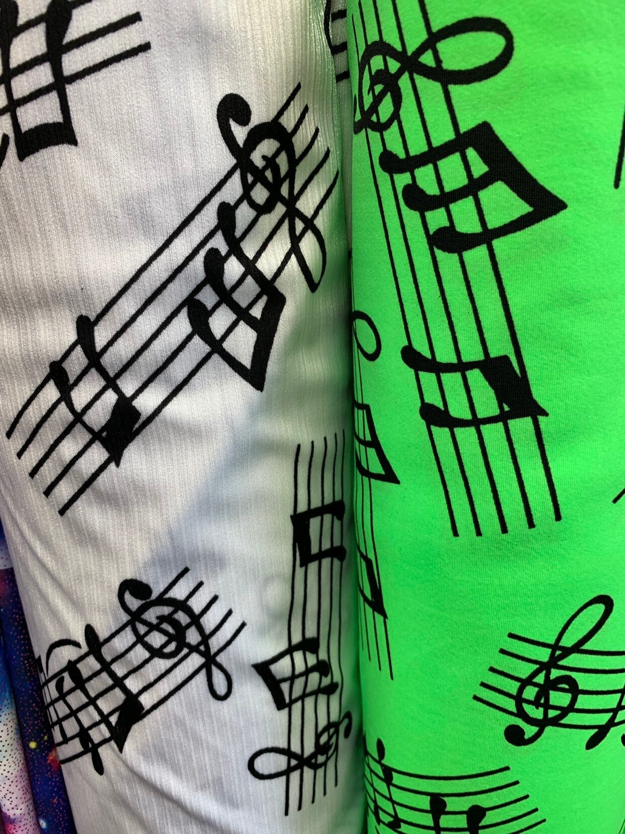 Music Notes design print on heavy nylon spandex 4way stretch 58/60" Sold by the YD. Ships worldwide from Los Angeles California USA.