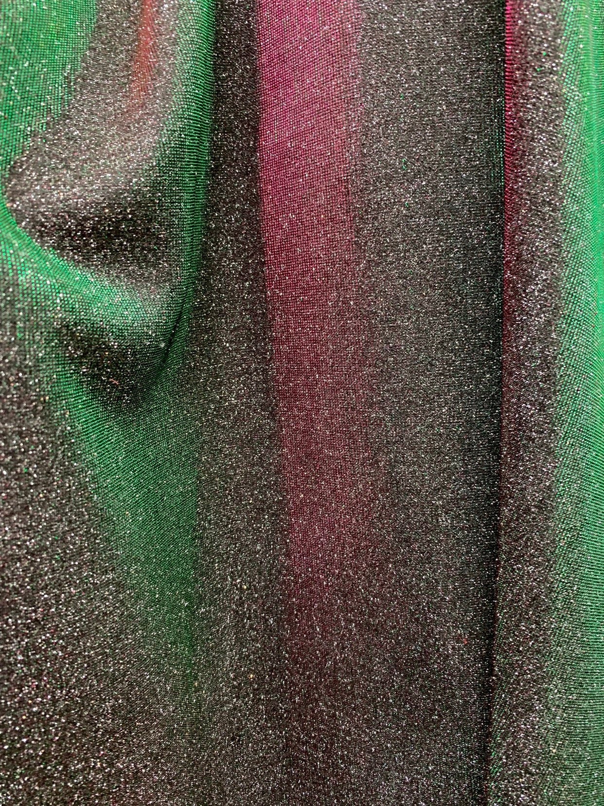 New Iridescent heavy metallic poly super techno fabric 4 way stretch 58/60" Sold by the YD. Ships worldwide from Los Angeles California USA.