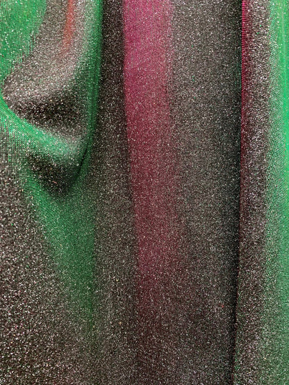 New Iridescent heavy metallic poly super techno fabric 4 way stretch 58/60" Sold by the YD. Ships worldwide from Los Angeles California USA.