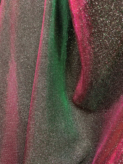 New Iridescent heavy metallic poly super techno fabric 4 way stretch 58/60" Sold by the YD. Ships worldwide from Los Angeles California USA.