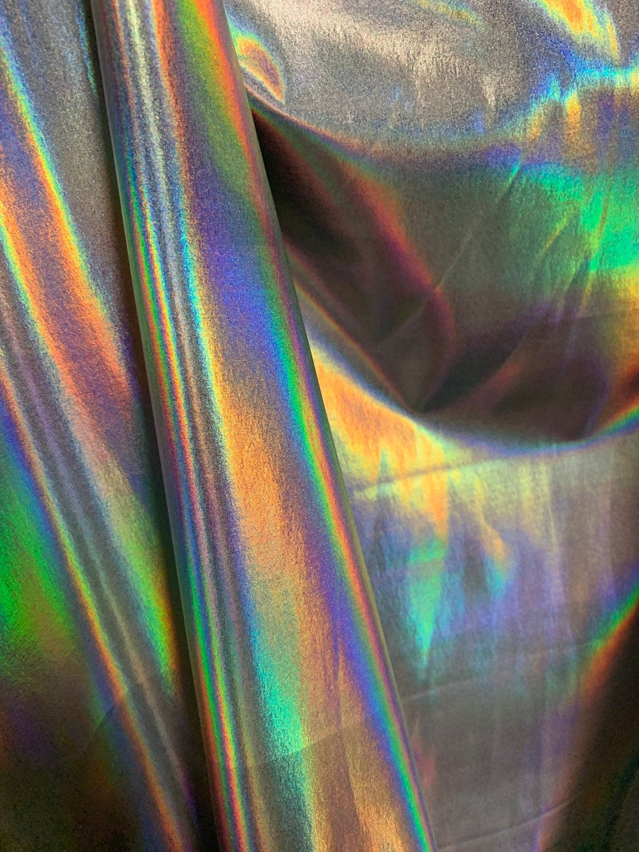 NEW Iridescent all over foil on nylon spandex 4way stretch 58/60" Shining Iridescent foil white/silver Sold by the YD. Ships worldwide.