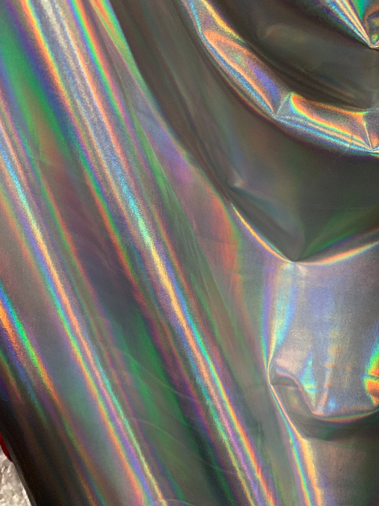 NEW Iridescent all over foil on nylon spandex 4way stretch 58/60" Shining Iridescent foil white/silver Sold by the YD. Ships worldwide.