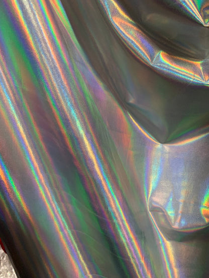 NEW Iridescent all over foil on nylon spandex 4way stretch 58/60" Shining Iridescent foil white/silver Sold by the YD. Ships worldwide.