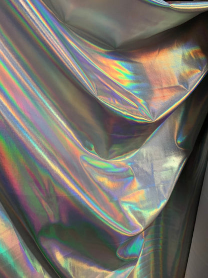 NEW Iridescent all over foil on nylon spandex 4way stretch 58/60" Shining Iridescent foil white/silver Sold by the YD. Ships worldwide.