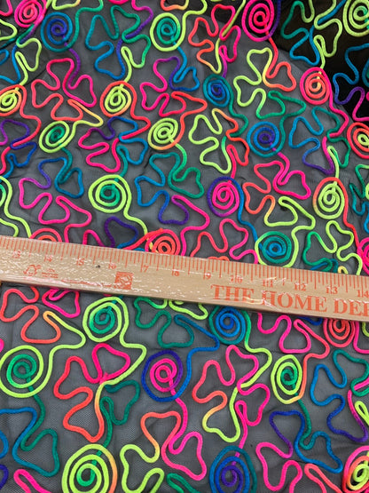 New stretch mesh swirl design rainbow color 2way stretch 55/57" Sold by the YD. Ships worldwide from Los Angeles California USA.