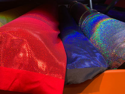 New Hologram metallic dots  all over nylon spandex 4way stretch 58/60" Sold by the YD. Ships worldwide from Los Angeles California USA.