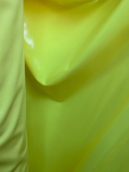 New stretch vinyl with foil Neon Yellow 4way 58/60" Sold by the YD. Ships worldwide from Los Angeles California USA.