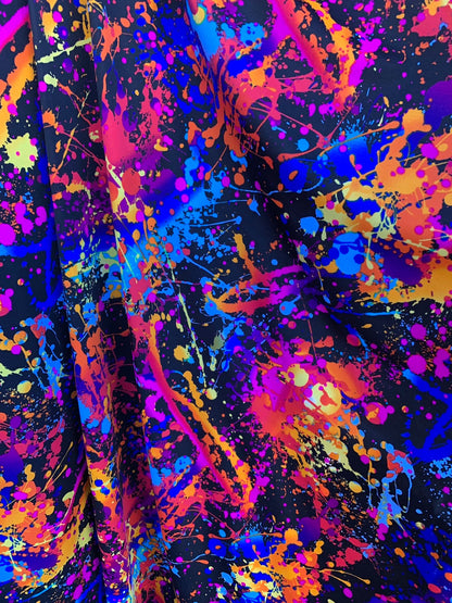 Graffiti paint design nylon spandex with foggy foil  4-way stretch. 58/60" sold by the YD. Ships worldwide from Los Angeles California USA