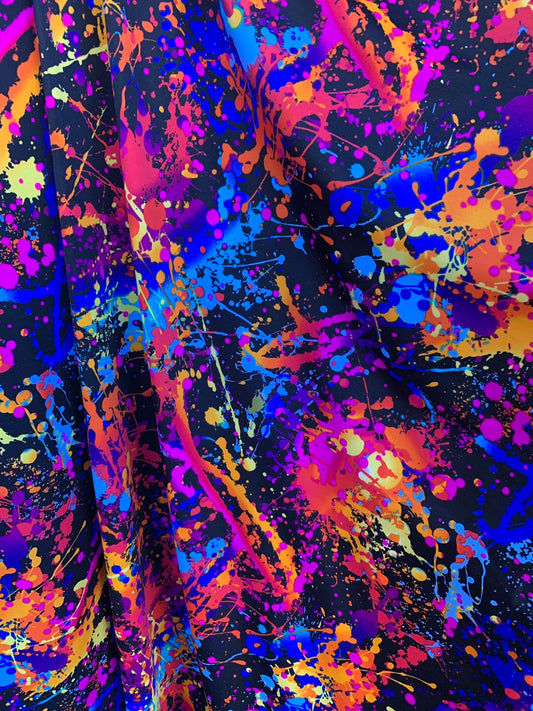Graffiti paint design nylon spandex with foggy foil  4-way stretch. 58/60" sold by the YD. Ships worldwide from Los Angeles California USA