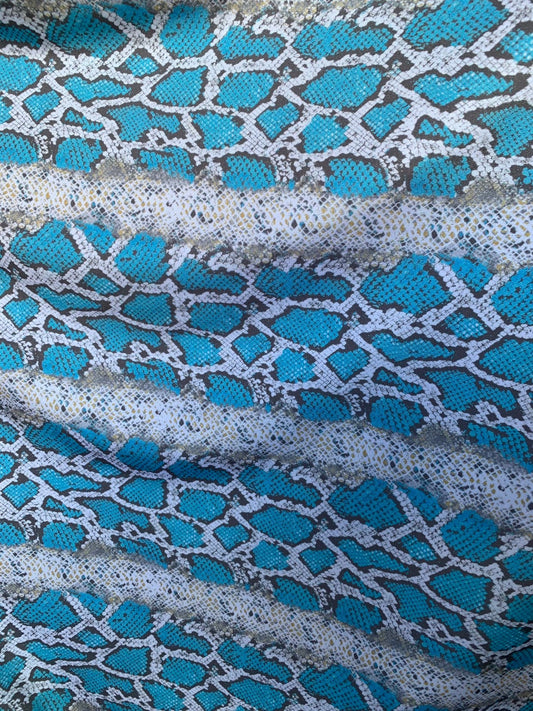 New snake print white/blue/gray  print on nylon spandex 4way stretch 58/60" Sold by the YD. Ships worldwide from Los Angeles California USA.