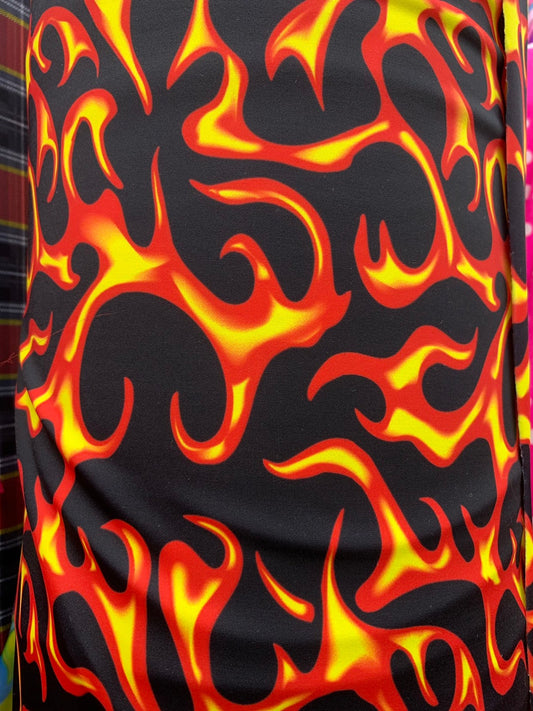 Hot flame design black/red print on heavy nylon spandex 4way stretch 58/60" Sold by the YD. Ships worldwide from Los Angeles California USA.