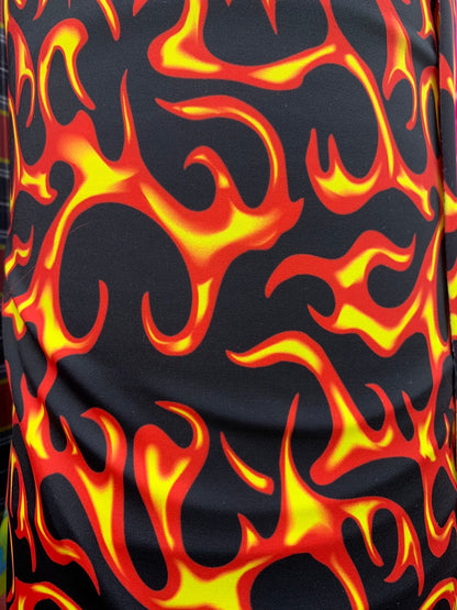 Hot flame design black/red print on heavy nylon spandex 4way stretch 58/60" Sold by the YD. Ships worldwide from Los Angeles California USA.