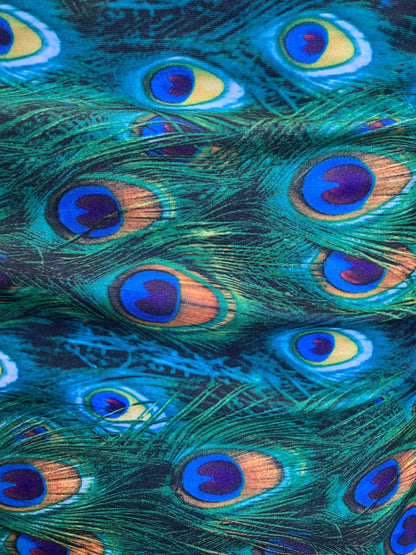 New peacock design print on nylon spandex 4way stretch 58/60" Sold by the YD. Ships worldwide from Los Angeles California USA.