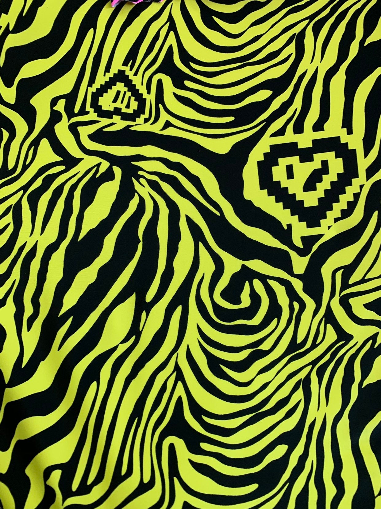 New zebra design black/yellow print on nylon spandex 4way stretch 58/60" Sold by the YD. Ships worldwide from Los Angeles California USA.